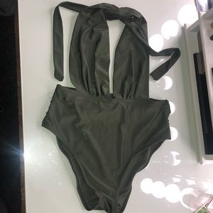 Green one piece bathing suit